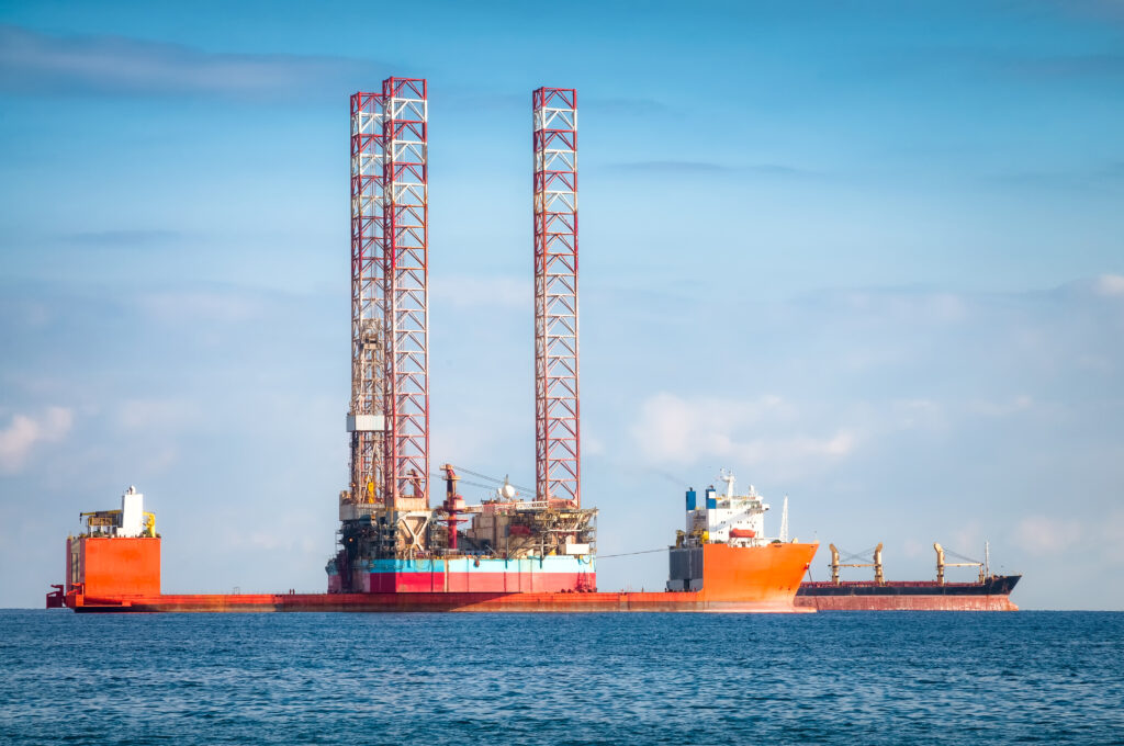 maritime lawyer oil rig in the middle of the ocean image