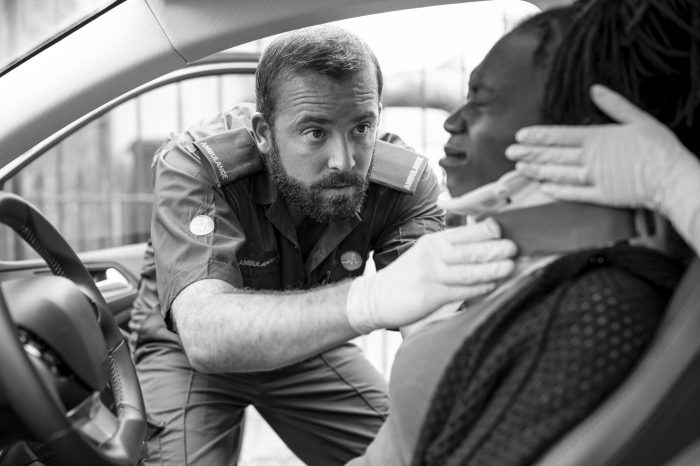 dui accident lawyer paramedic saving women in car image